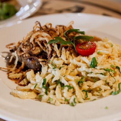 Spätzler mit Champignons
