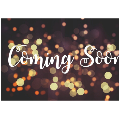 Feierliche Lichtstrahlen mit Text "Coming soon"